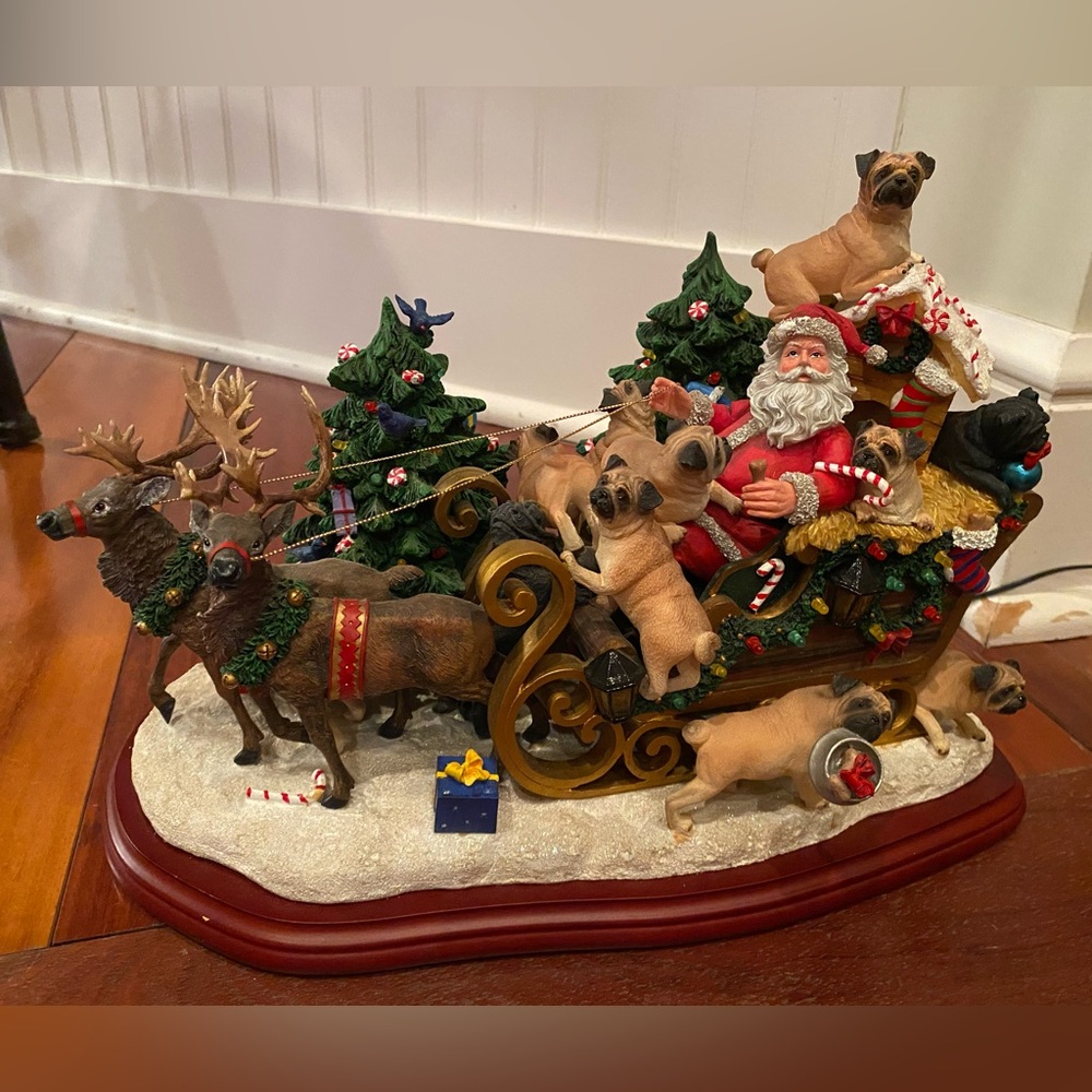 The Danbury Mint Pug Christmas Sleigh.